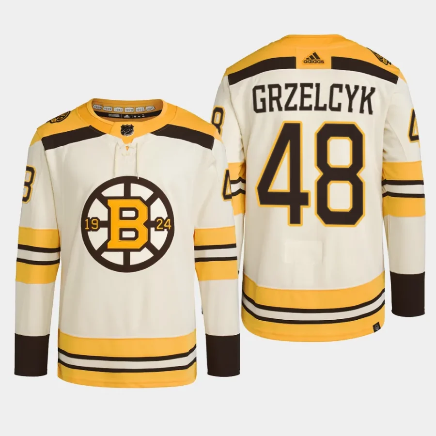 men bruins matt grzelcyk 2023 24 primegreen 100th anniversary authentic player cream jersey